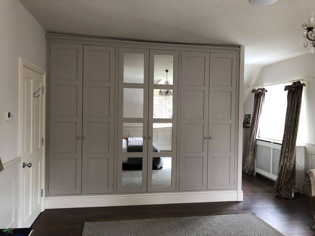 A bedroom which was design built and installed by Grover Furniture Ltd